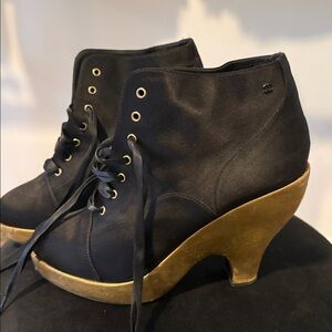 CHANEL Elegant Black Satin Boots